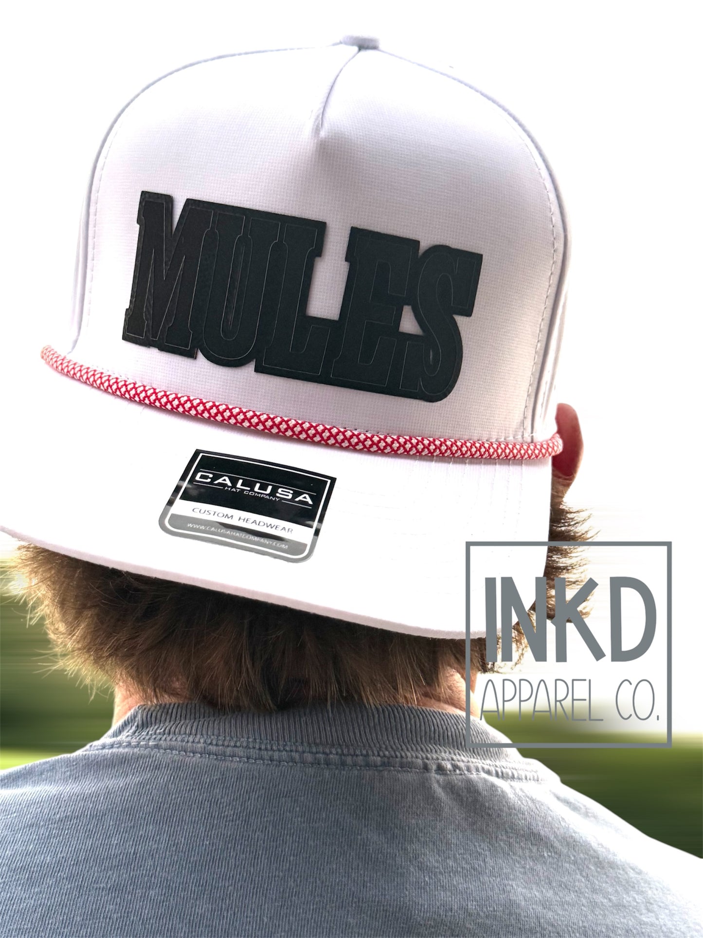 Mule’s Black Block Leather with white hat and red rope